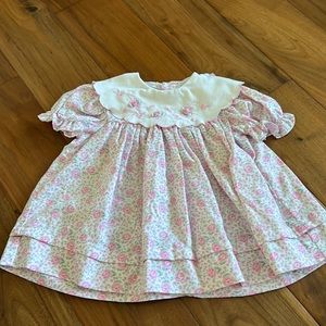 Pretty little girl’s dress w/rosettes on collar 18 mo. No rips, tears/stains